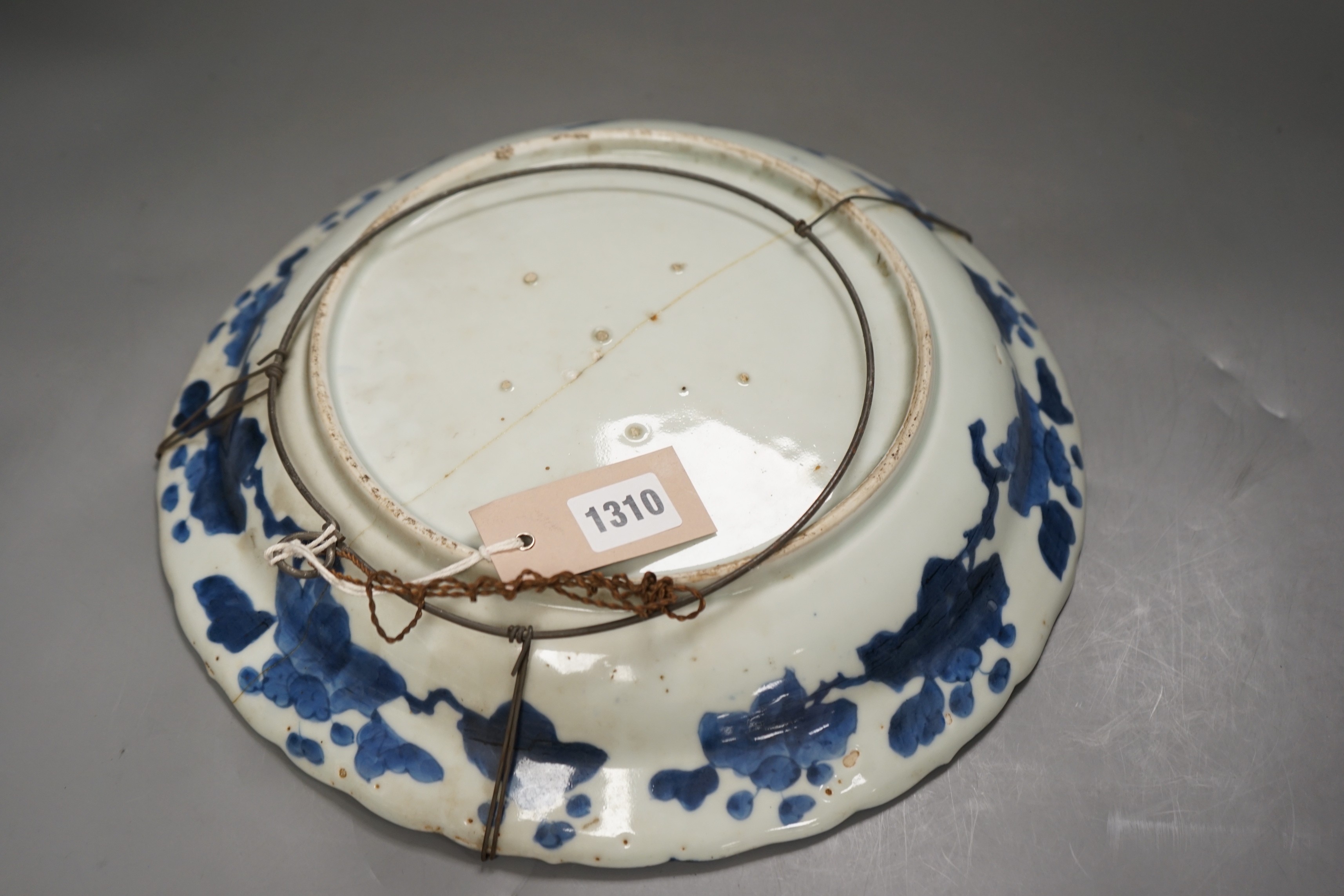 An 18th century Arita blue and white dish, 34cm